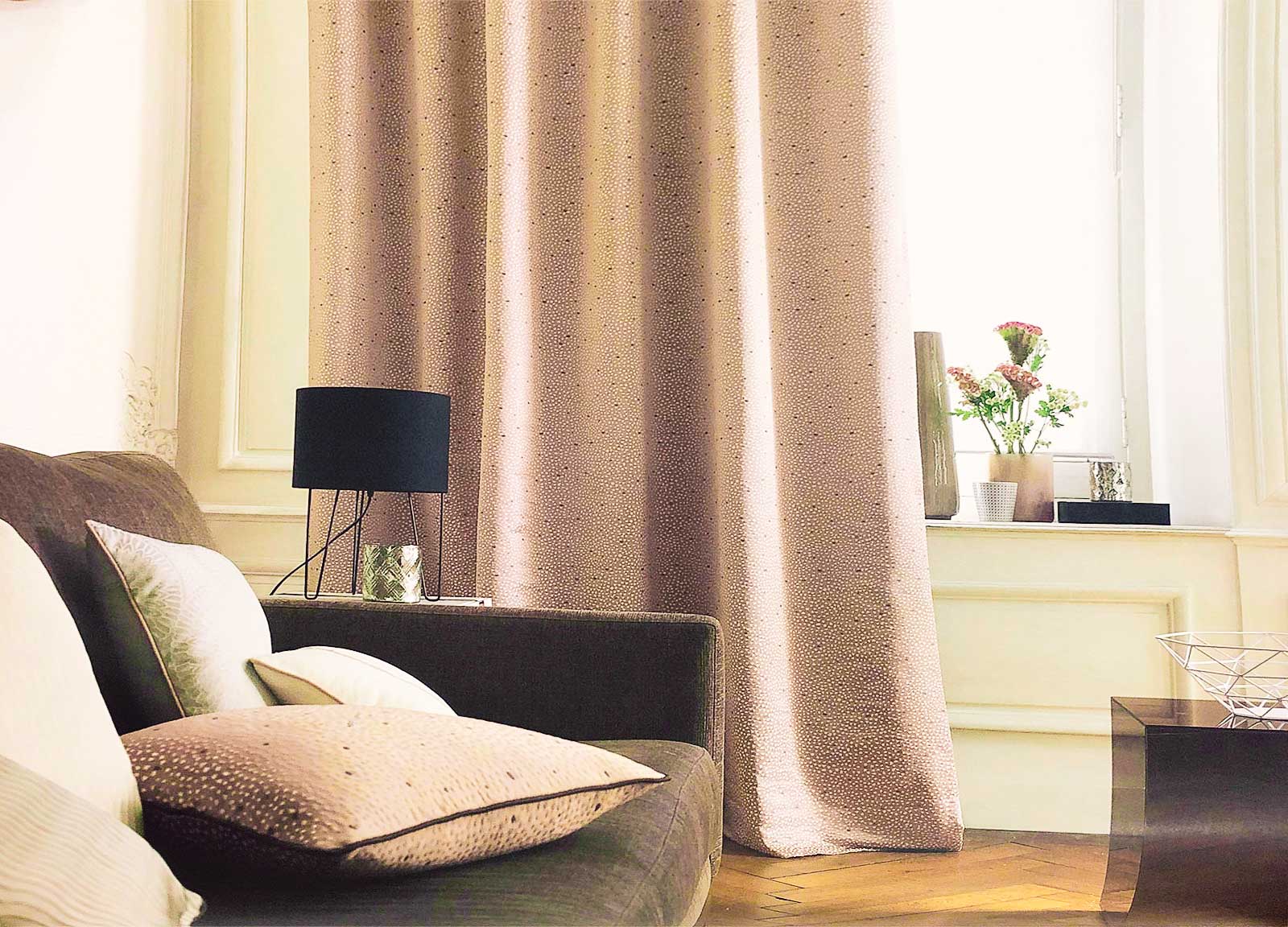 Textured curtains in a softly lit sitting room